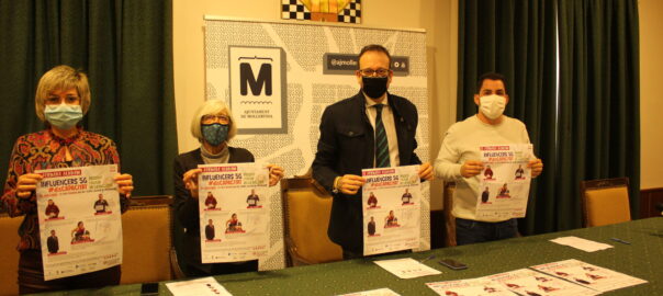 A.Carné, A.Roure, M.Solsona i A.Garcia amb el cartell de la II Jornada ACUDAM