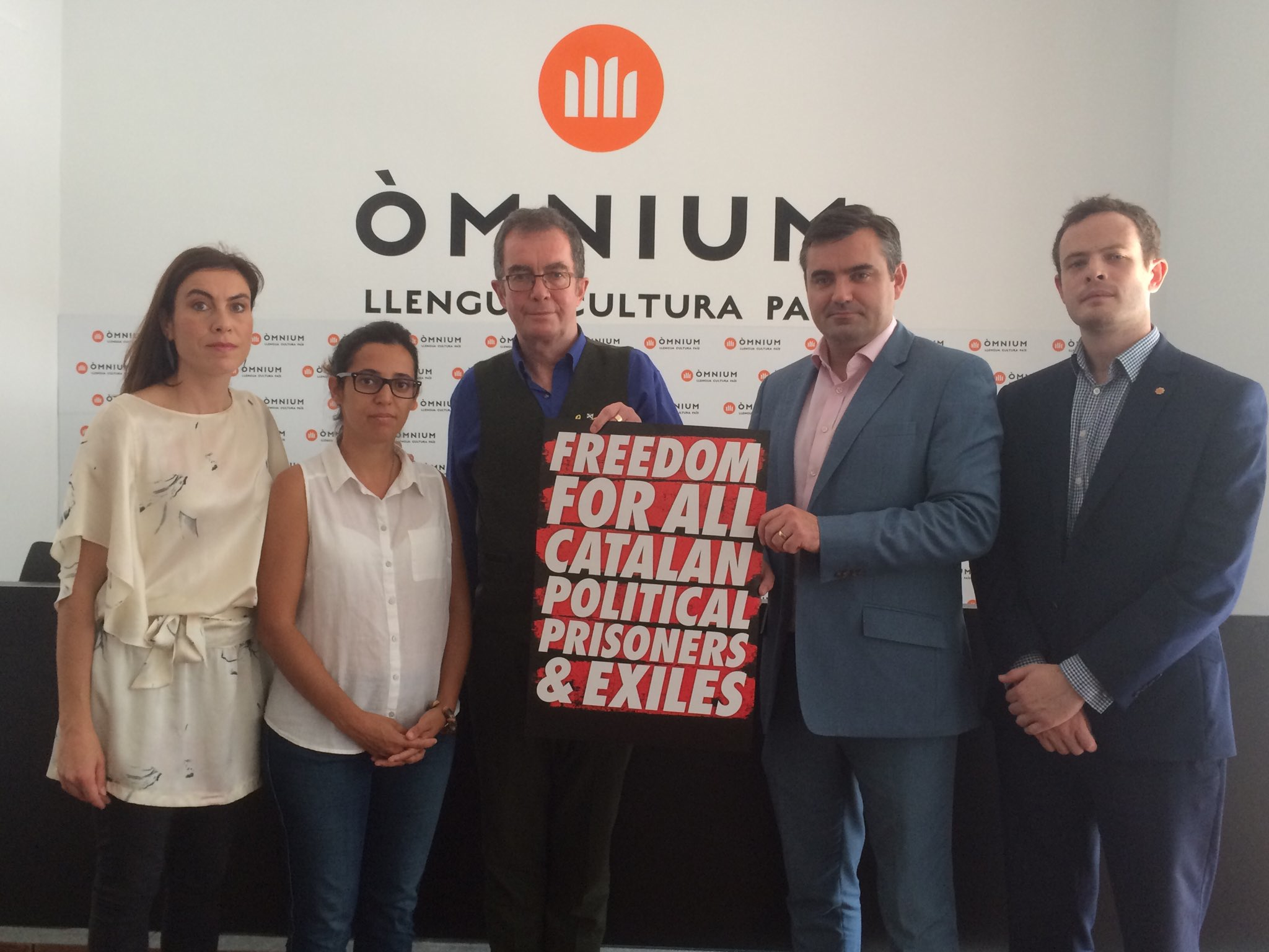 Gavin Newlands (second from right) yesterday at Òmnium Cultural's headquarters