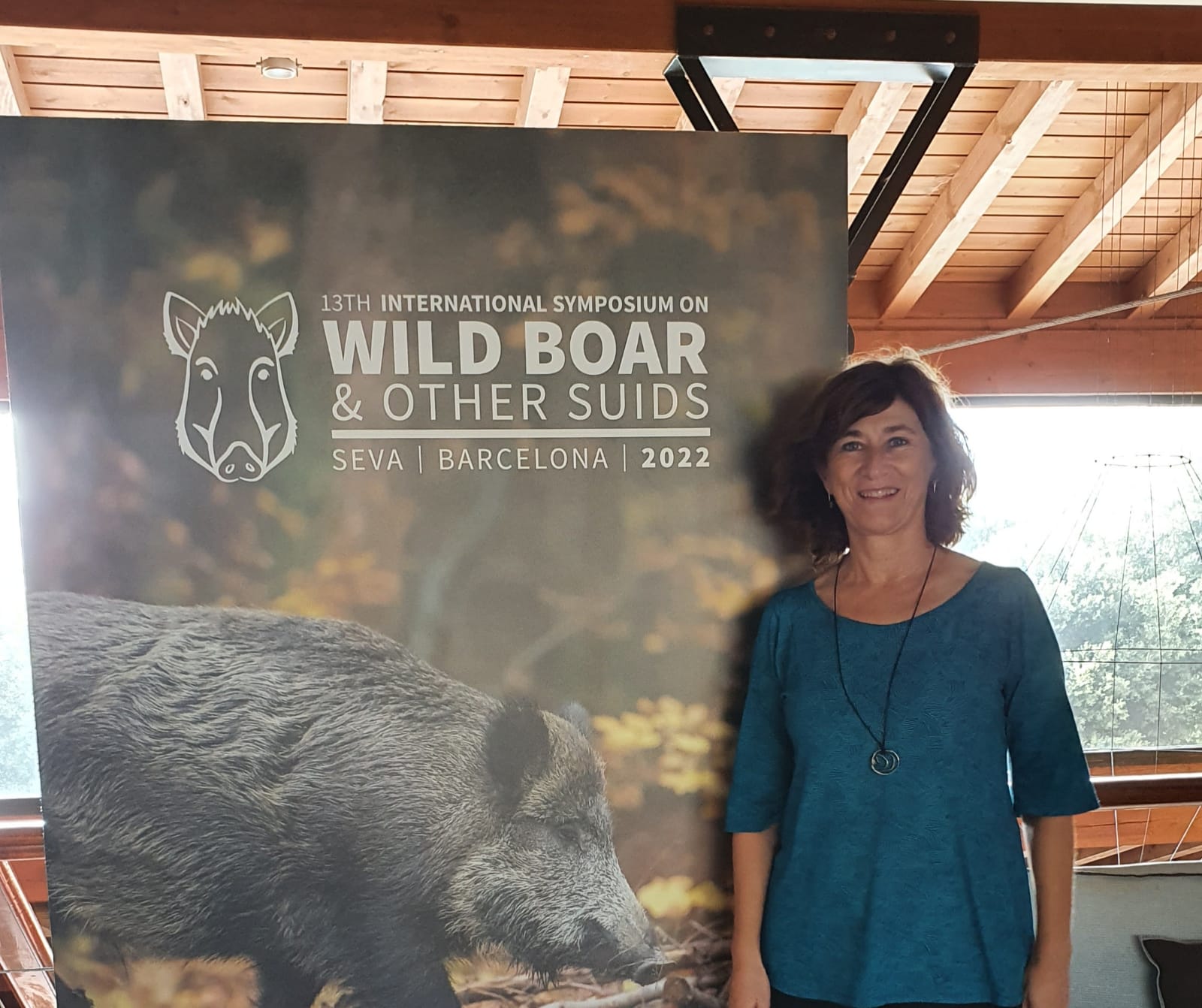 Rosell amb el cartell del simposi de fons (fotografia: cedida)